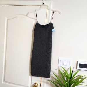 A size large black and glitter holiday body con dress with T straps. $19